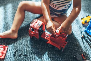 Little boy playing with toy